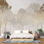 Tapet personalizat forest cu o padure de copaci aurii pe un fundal ce imita o tencuiala oferind un contrast elegant si o atmosfera sofisticata stucco forest