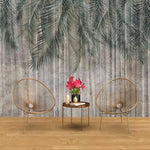 Tapet personalizat leaf cu frunze de palmier in nuante de verde pe un fundal inchis de perete texturat palm green