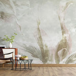 Tapet personalizat leaf cu frunze tropicale in nuante fade de verde pe un fundal deschis faded exotic