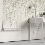 Tapet personalizat leaf cu frunze mici delicate in nuante de verde pal cazand in cascada ideal pentru un decor proaspat si primitor pretty little leaves
