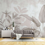 Tapet personalizat leaf cu frunze stilizate in tonuri de bej si gri cu un aspect de hartie texturata ideal pentru un decor natural si calm paper leaves