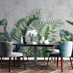 Tapet Personalizat Leaf cu frunze tropicale pe un fundal de perete cimentat - GROWING OVER