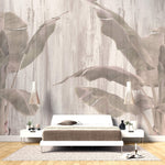 Tapet Personalizat Leaf cu bananieri intr-un fundal gri texturat - PINKY BANANA TREES