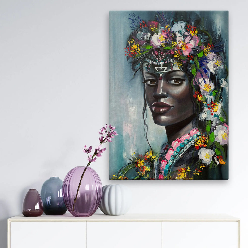 Tablou canvas ce ilustreaza o femeie tanara africana purtand flori multicolore a young african woman