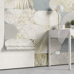 Tapet personalizat fine art cu frunze tropicale in nuante de alb auriu si albastru deschis tropical leaves blend