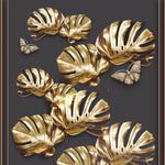 Tapet personalizat fine art cu frunze aurii de monstera pe un fundal negru brass monstera