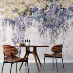 Tapet personalizat floral cu arborele wisteria in nuante de mov si rozaliu raspandit pe un perete de beton wisteria wall