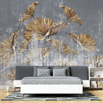 Tapet personalizat leaf cu frunze aurii pe un perete texturat gri golden leaves